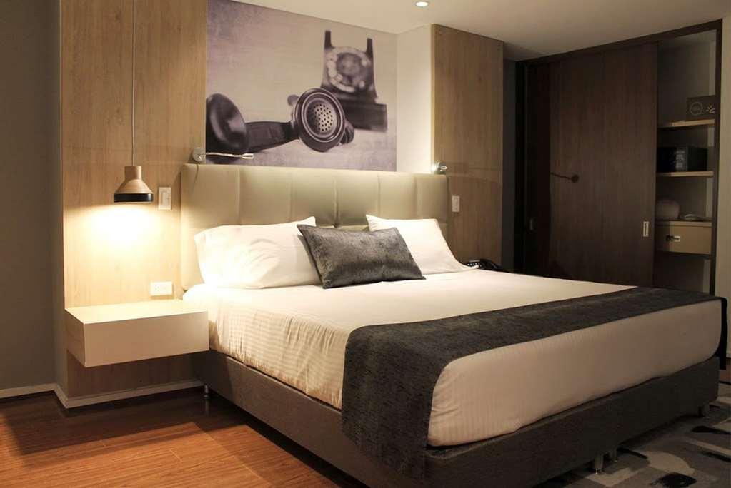 Quo Quality Hotel Манісалес Номер фото A bedroom at the hotel